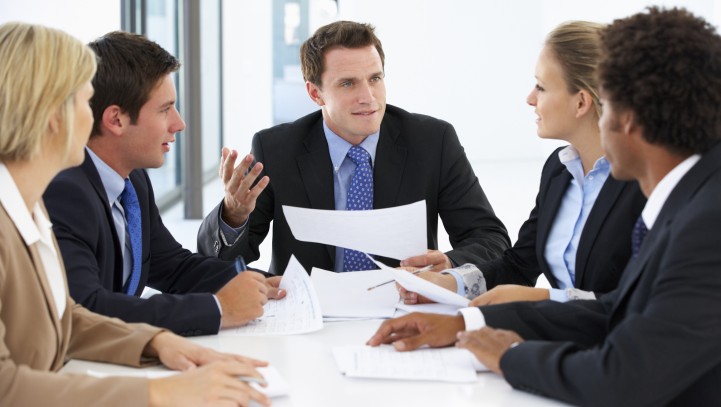 Group Of Business People Having Meeting In Office